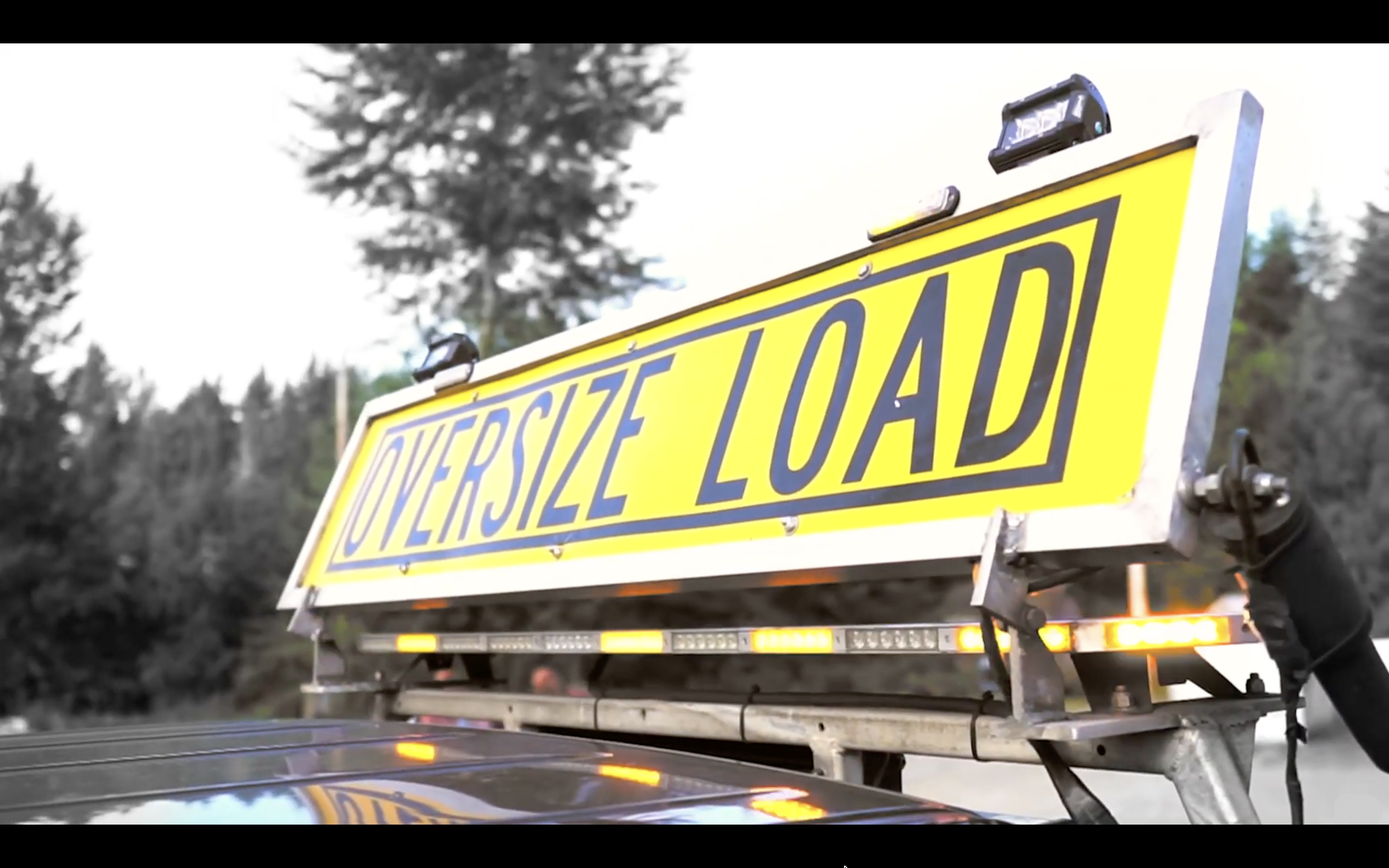 Oversize Load sign with amber flashers