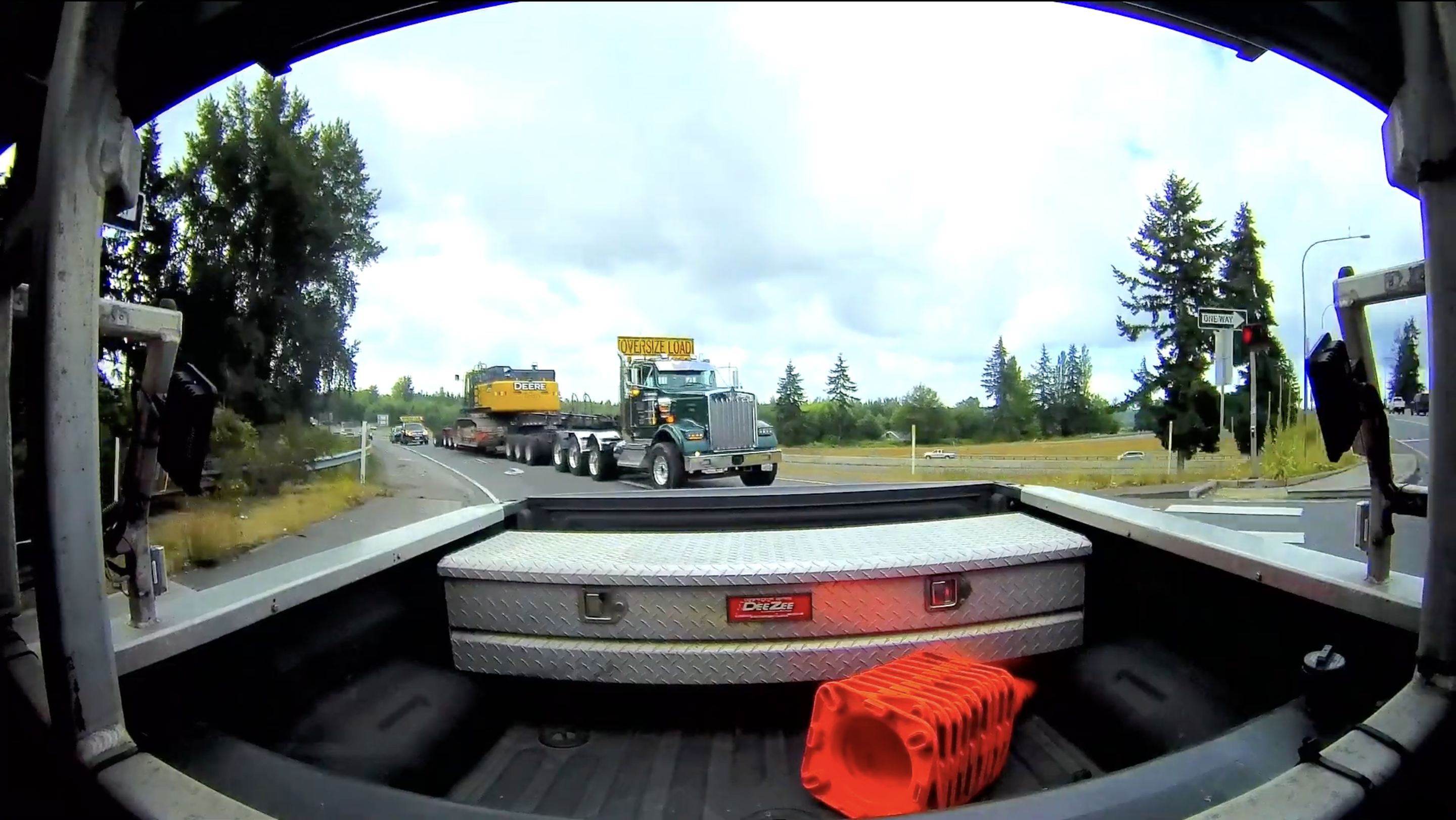 Escort vehicle POV following oversized load